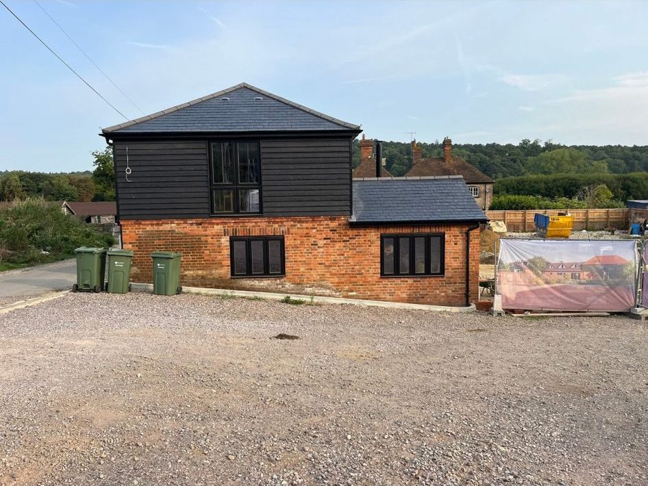 Modern single-storey brick extension by Green's Brickwork & Building